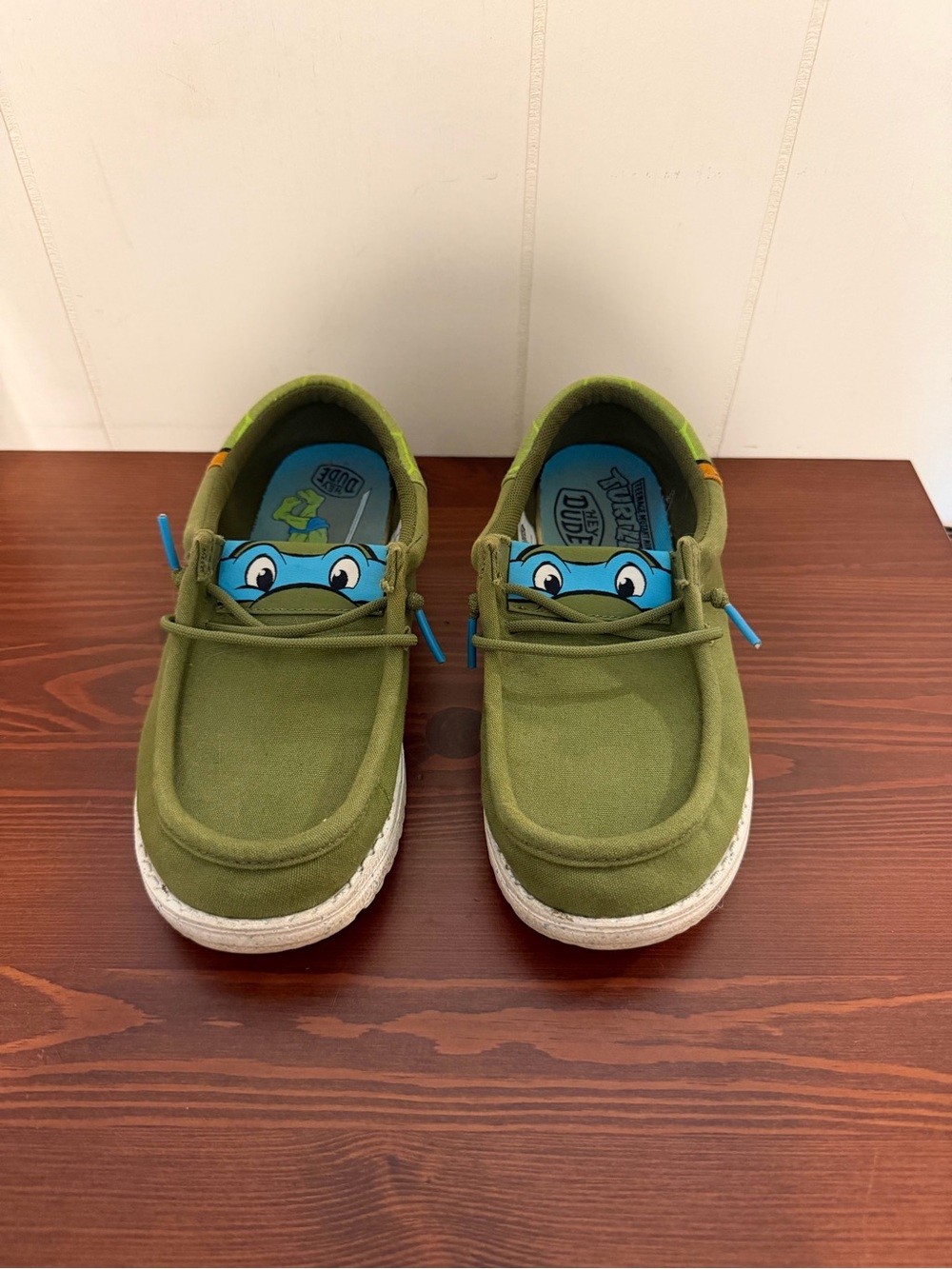 Hey Dude Olive Green Slip-On Kids Sneakers with Blue Character Accent